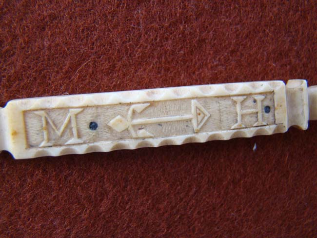 A fabulous 19th century sailor carved whalebone BODKIN with an anchor and the initials 'M H'  — image 2
